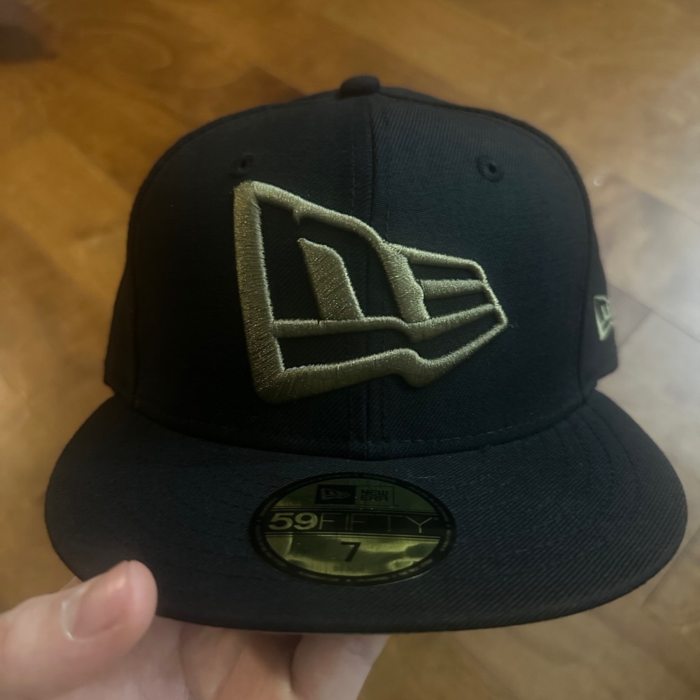 New Era Black Cap with Green Logo